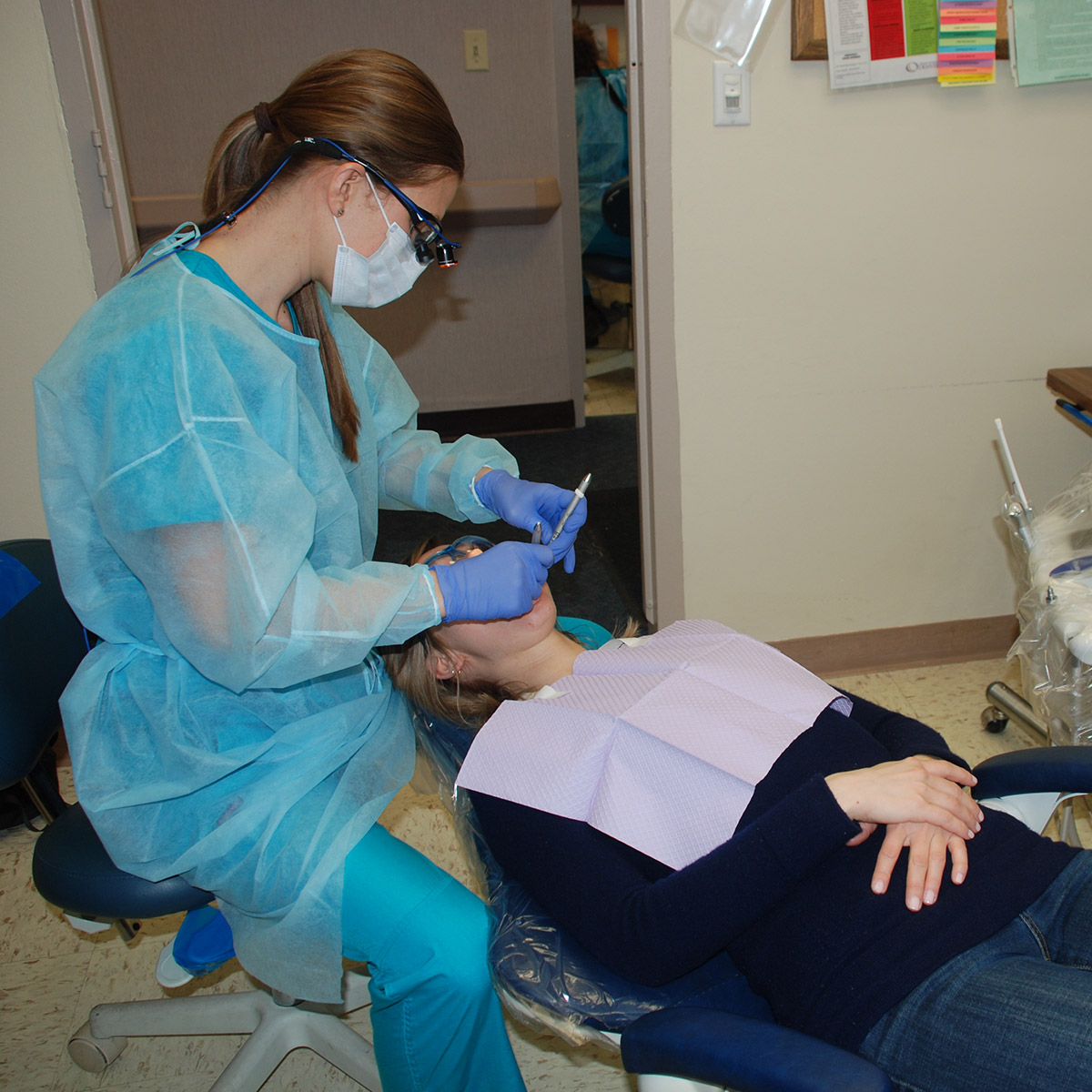 CCD Dental Hygiene student with a patient