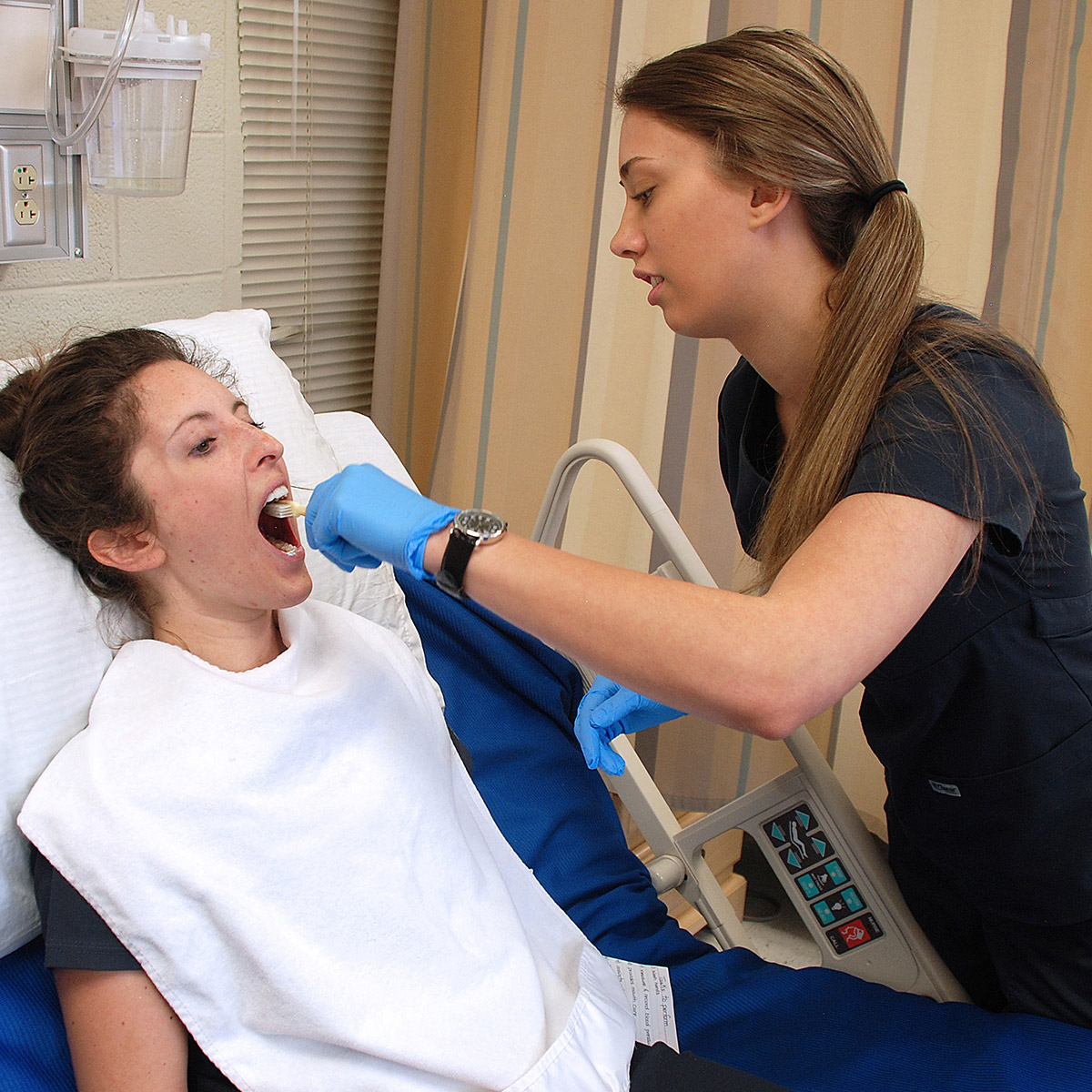 CCD Practical Nursing student assisting a patient
