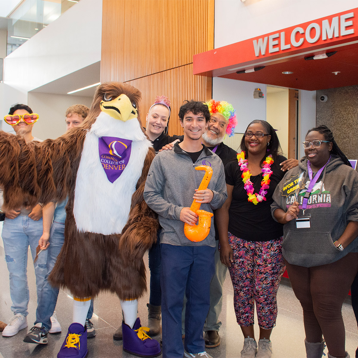 group of CCD students posing with the Swoop mascot