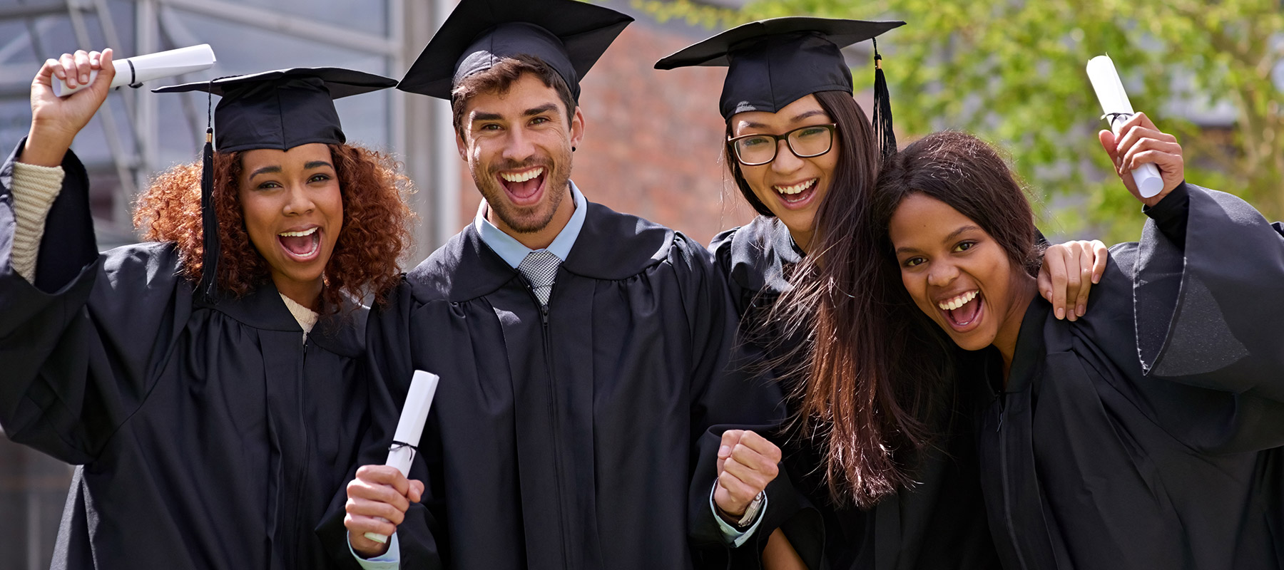 CCD High School Diploma graduates in regalia