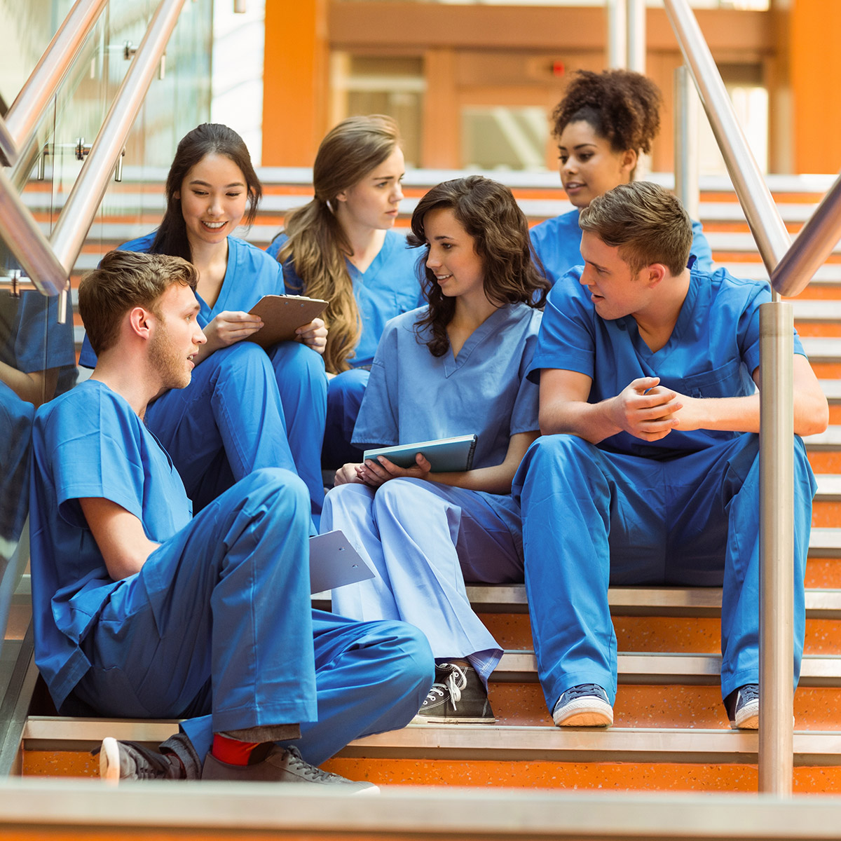 group of CCD pre-health students sitting on a staircase