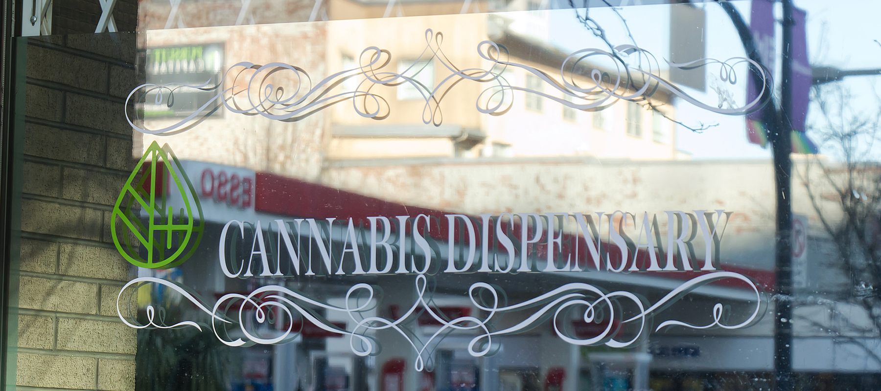 Cannabis dispensary sign on retail window