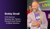 Man with facial hair wearing purple shirt and blazer. Bobby Small CCD Alumnus - Business Dev. Partner - Microsoft Gold Partner at Ellipse Solutions.